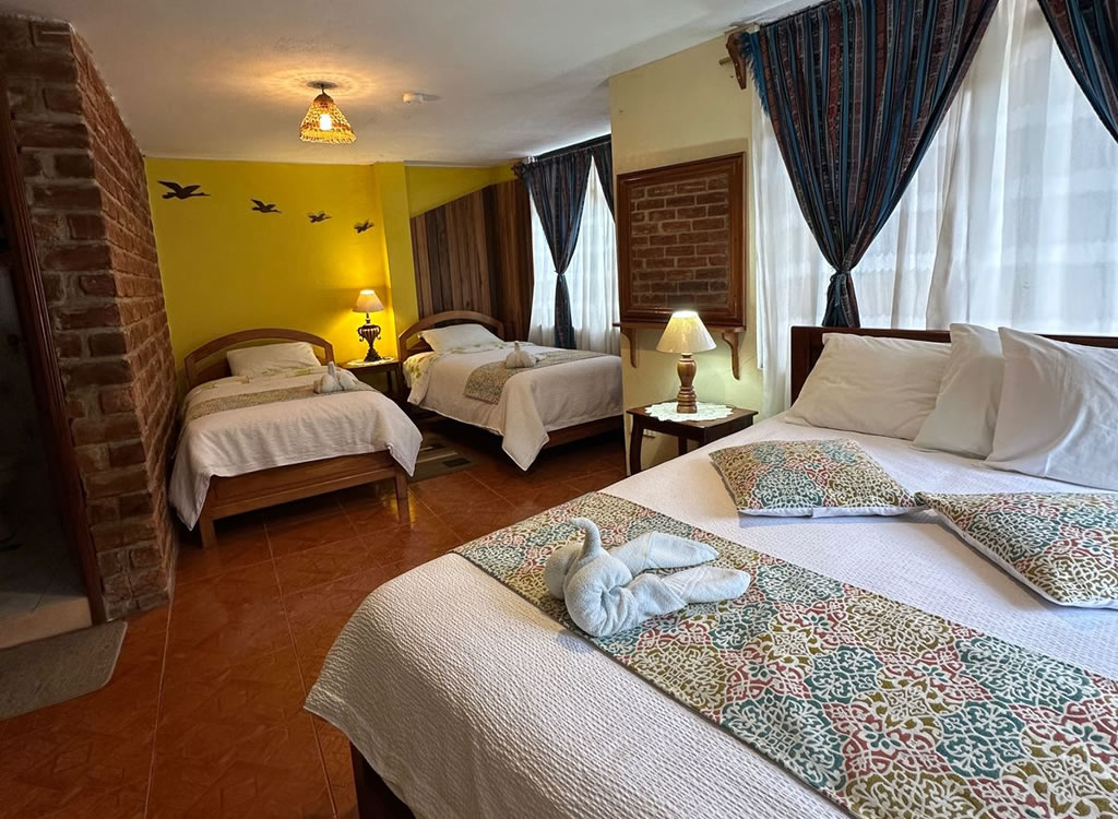 Habitación Familiar con vistas al jardín